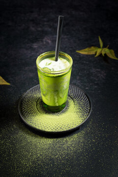 Cold matcha latte drink in glass