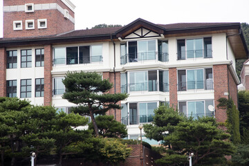 Red brick villa with surveillance camera