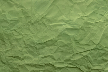 Fototapeta premium crumpled paper. sheet of green paper. detailed high resolution texture. abstract background for wallpaper.