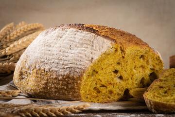 Freshly artisan baked wheat, turmeric and rye bread, country bread. Simple bread for breakfast