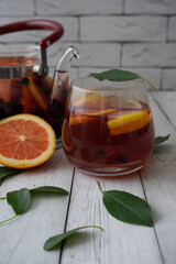 fruit tea made from fresh berries in a glass