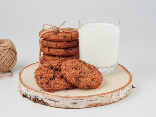 Homemade oatmeal cookies folded in a pile on the old table