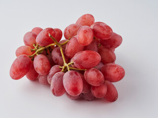 Grapes. Red grape. Grape branch isolated on white. With clipping path. Full depth of field.