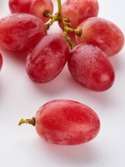 Grapes. Red grape. Grape branch isolated on white. With clipping path. Full depth of field.