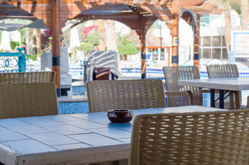 empty cafe near the pool without people
