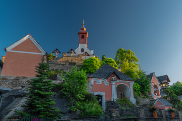 Kalvarienbergkirche church with many of chapels on small hill in summer morning