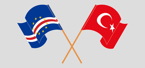 Crossed and waving flags of Cape Verde and Turkey