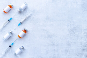 Vaccination concept. Vaccine vial dose with with syringe