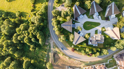 Aerial view of a townhouse village. Modern residential complex in mountain nature. houses aerial birds eye view suburb housing development new neighborhood. modern architecture and design