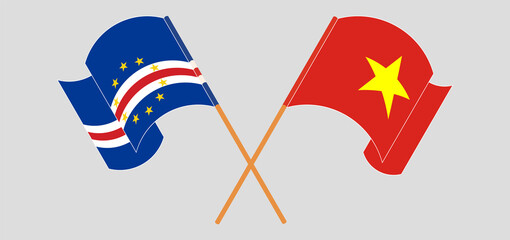 Crossed and waving flags of Cape Verde and Vietnam