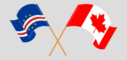 Crossed and waving flags of Cape Verde and Canada