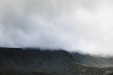 time clouds over mountain