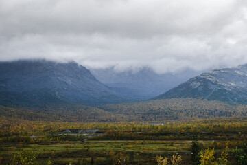 clouds in the mountains in autumn