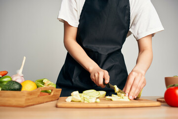 Obraz na płótnie Canvas slicing vegetables kitchen cooking healthy eating
