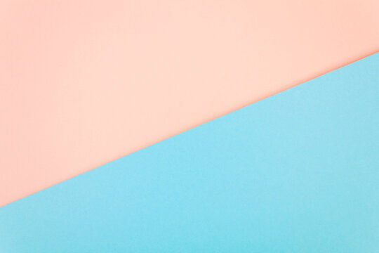 Abstract pink and blue pastel colored paper texture. Geometric shapes and lines. Minimalist background. Flat lay. Copy space.