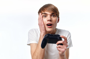 guy with joystick in hand video games entertainment light background