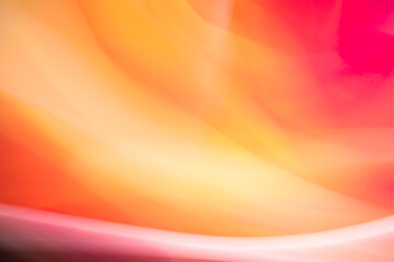 Abstract background of waves in red tones. Backdrop for web design, packaging, advertising.