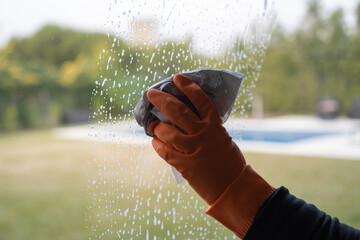 cleaning the glass of a window