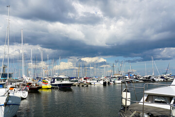 beautiful landscape with boats, sailboats and yachts in marina bay