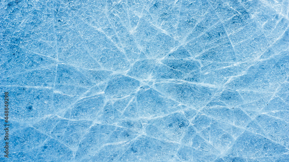 Aufkleber beautiful ice texture with cracks of a frozen puddle on the asphalt for 3d texturing or design.