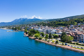 Fototapeta na wymiar Aerial view of Evian (Evian-Les-Bains) city in Haute-Savoie in France