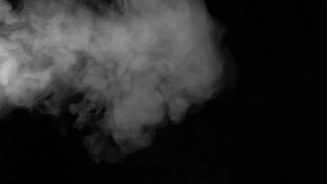 smoke overlay footage for creative video presentation. smoke motion effect on black background. floating fog illustration for decorating any video project.