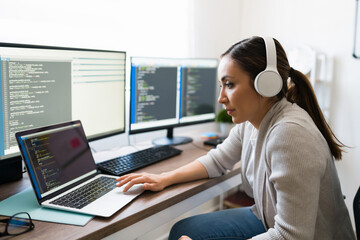 Freelance woman coding a software app