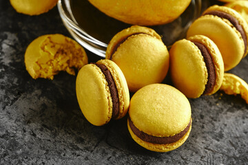 macaroons on grey stone background