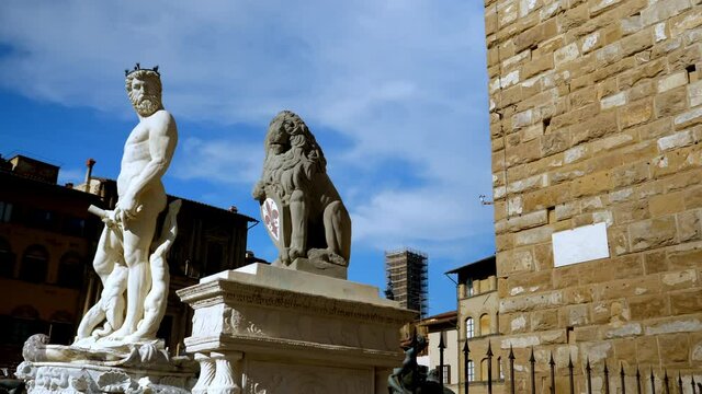 Fountain of Neptune and Lion marzocco on Piazza della Signoria in front of the Palazzo Vecchio, Florence, Italy