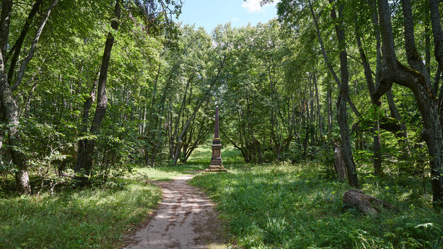 Russia. The town of Yaropolets. Park of the Zagryazhsky-Goncharovs Estate. Granite obelisk in memory of the visit of Empress Catherine II
