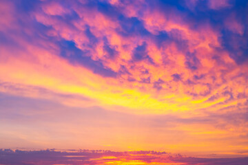 Dramatic bright sky at sunset. Panorama, background for text. Blurred focus.