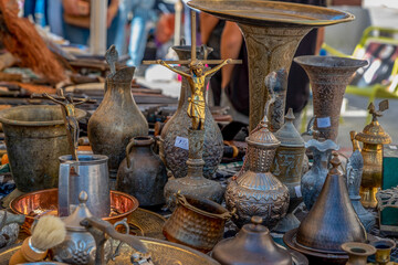 Brass and other metal objects including religious items  sold at the flea market in Tel Aviv, Israel
