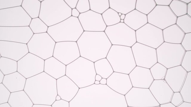Purple fluid flows between different sized light violet bubbles making them move and filling the space among them | Background shot for skin care cosmetics with hyaluronic acid commercial