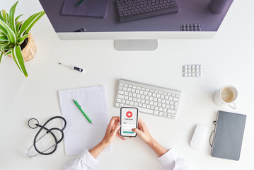 Top view of a desk of a female doctor