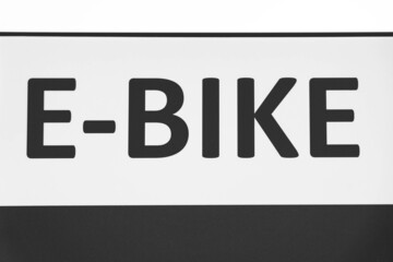 Illustration of an e-bike sine in black and white colors