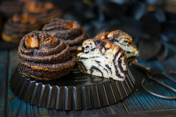 Fototapeta premium Puff buns with poppy seeds and sugar