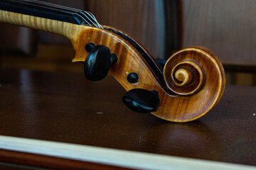 Fototapeta premium Part of the violin. Side view. Violin handle.