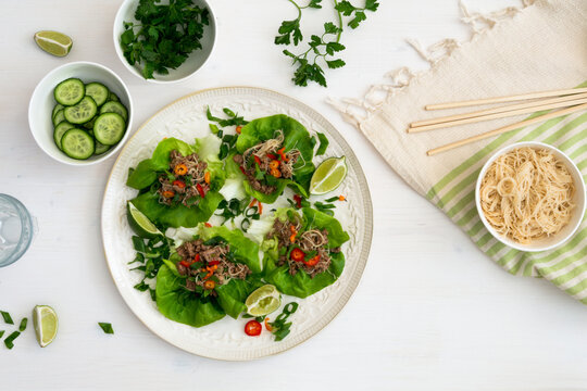 Healthy Asian beef and noodle lettuce wraps
