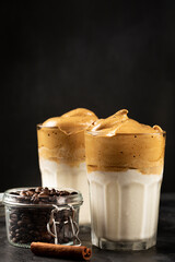 Iced Dalgona Coffee, glass with milk and coffee cream.