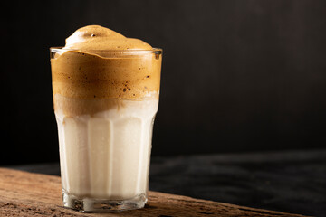 Iced Dalgona Coffee, glass with milk and coffee cream.