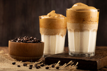 Iced Dalgona Coffee, glass with milk and coffee cream.