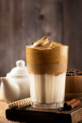 Iced Dalgona Coffee, glass with milk and coffee cream.