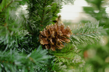 Artificial spruce branch with pine cone for.