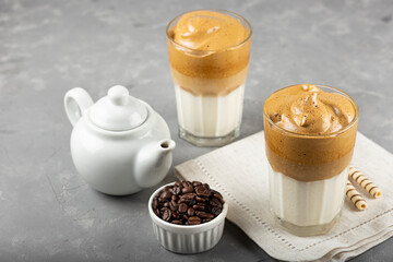 Iced Dalgona Coffee, glass with milk and coffee cream.