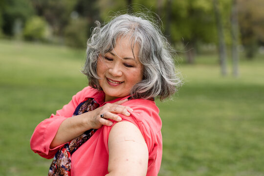 Senior Woman Proudly Shows Off Arm Muscles After Yoga