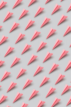 Pattern of pink paperplanes