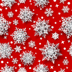 Christmas seamless pattern of paper snowflakes with soft shadows, white on red background