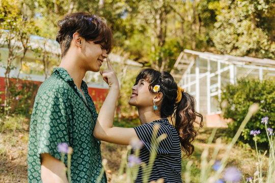 Young asian couple outdoors