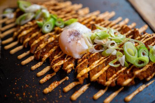 Sliced Breaded Steak On A Table. 