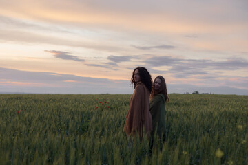 two girls in the field

